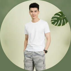Circular portrait of Xavier Reed, a young man with dark hair, smiling and wearing CARGONIX shorts with a washed camouflage fi